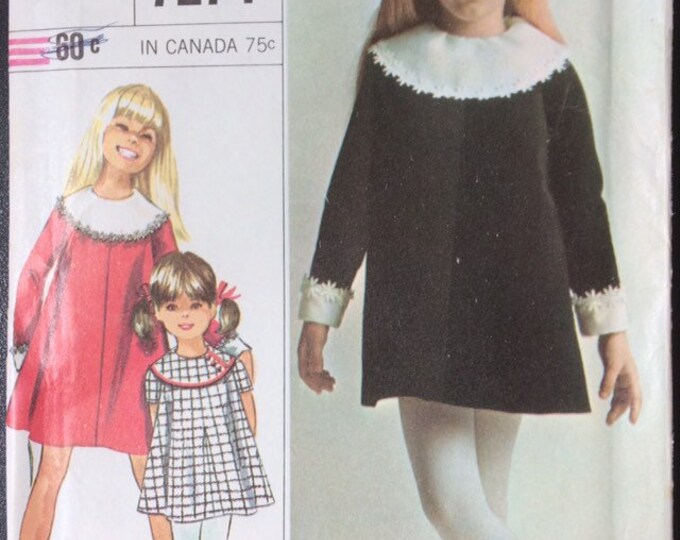 Girl's designer dress with detachable collar and cuffs Simplicity pattern