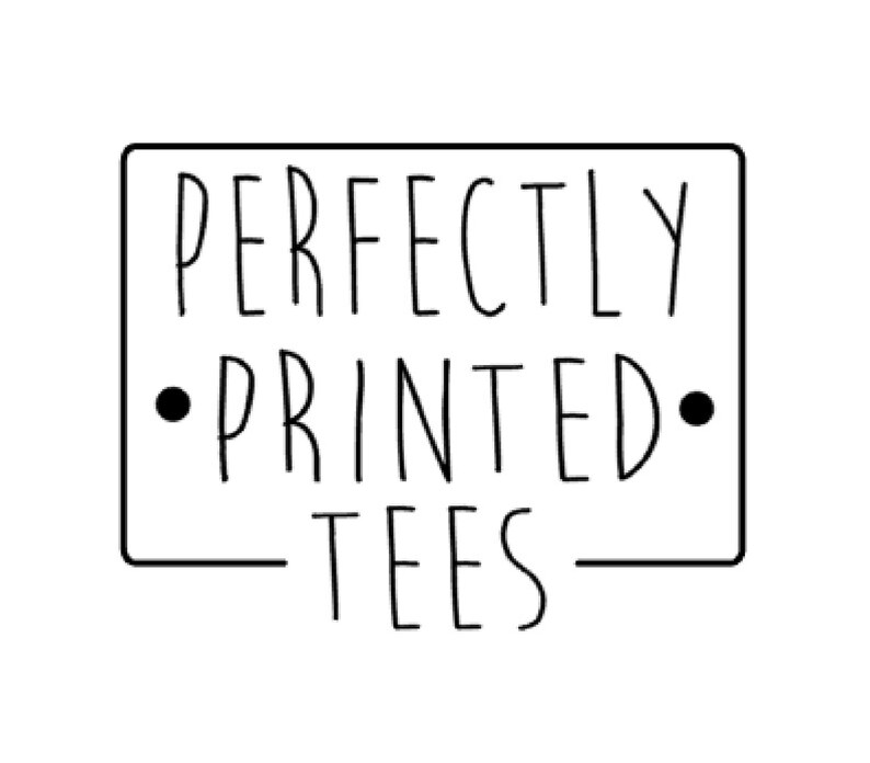 May include: Black and white graphic design with the text "PERFECTLY PRINTED TEES" inside a rectangle.