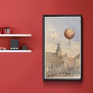 Montgolfière avec deux passagers montant au-dessus d'une place de la ville, avec des drapeaux français - Reproduction vintage d'affiche d'art en montgolfière.