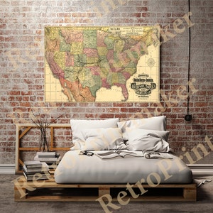 May include: A vintage map of the United States showing railroad lines and routes. The map is titled "Railroad Map of the United States, Atchison, Topeka & Santa Fe Railroad." The map is printed on a cream-colored paper and has a brown, red, and green color scheme.
