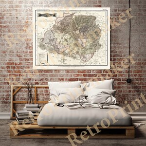 May include: An antique map of Hidalgo, Mexico, printed in black and white with hand-drawn details. The map shows the state's borders, major cities, and surrounding states. The title "Hidalgo" is printed in a decorative font at the top of the map.