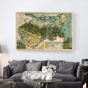 May include: A vintage map of the Soviet Union, depicting the various geographical regions and their natural resources. The map is illustrated with images of animals, plants, and landscapes. The text "CCCP" is visible in the top left corner.