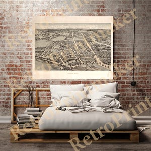 May include: An antique map of Dedham, Massachusetts, showing the town's layout and streets. The map is printed in black and white and has a vintage aesthetic.