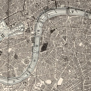 May include: A detailed black and white map of London, England, showing the River Thames winding through the city. The map includes street names and landmarks, such as Buckingham Palace and the Houses of Parliament.