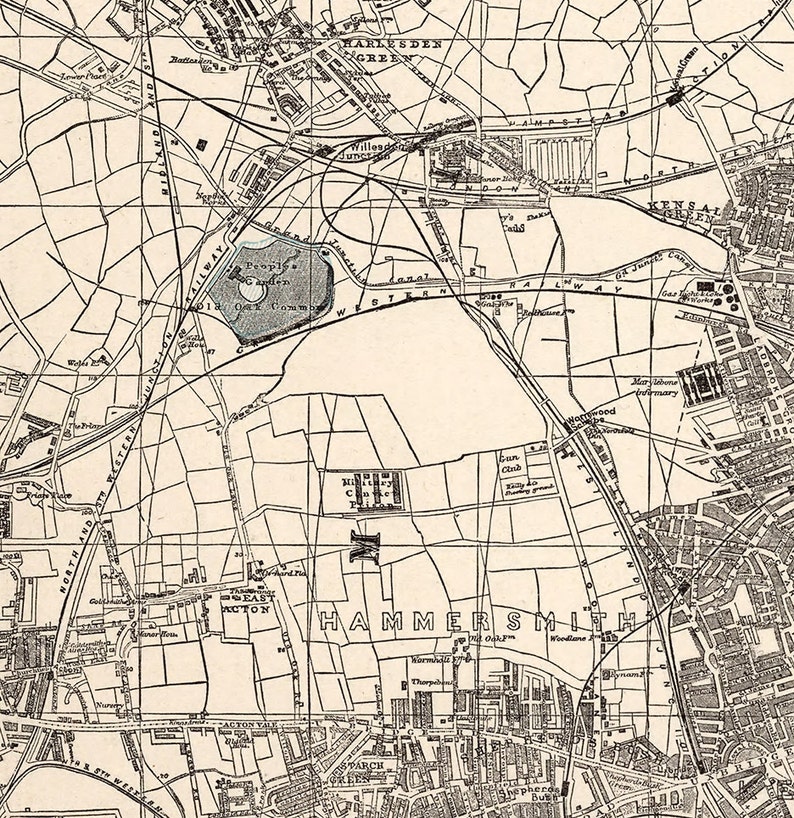May include: A black and white map of London, England, showing the areas of Hammersmith, Kensal Green, and East Acton. The map includes street names, landmarks, and railway lines.