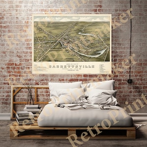 May include: An antique bird's eye view map of Garrettsville, Portage Co., Ohio, with a population of 1000. The map shows the town's layout with streets, buildings, and a river winding through the center.