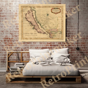 May include: An antique map of the western coast of Mexico, titled "Provincia de Guadalaxara y California" with a key and various geographical features labelled in Latin.