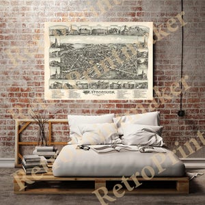 May include: A vintage black and white map of Westborough, Massachusetts, showing the town's layout and key landmarks. The map is printed on a cream-colored paper and framed with a black border.