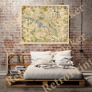 Op de afbeelding: Een vintage kaart van Boston, Massachusetts, met een beige achtergrond en kleurrijke details. De kaart toont een gedetailleerd stratennetwerk, waterwegen en bezienswaardigheden. De kaart is omgeven door een rand met wapenschilden.