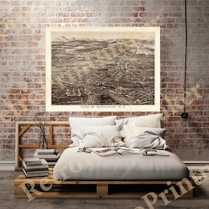 May include: A vintage black and white aerial view map of Kingston, New York. The map shows the city's streets, buildings, and waterways. The text "City of Kingston, N.Y." is printed at the bottom of the map.