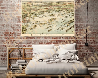 May include: A vintage bird's eye view map of Casco Bay, Portland, Maine and surrounding waters. The map is printed on a cream-colored paper with a red border and text. The map shows the coastline, islands, and waterways of the area.