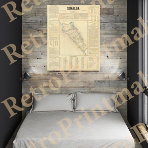 May include: A vintage map of Sinaloa, Mexico, printed on paper and framed in a wooden frame. The map is hanging on a wall in a bedroom with a bed and two pillows.