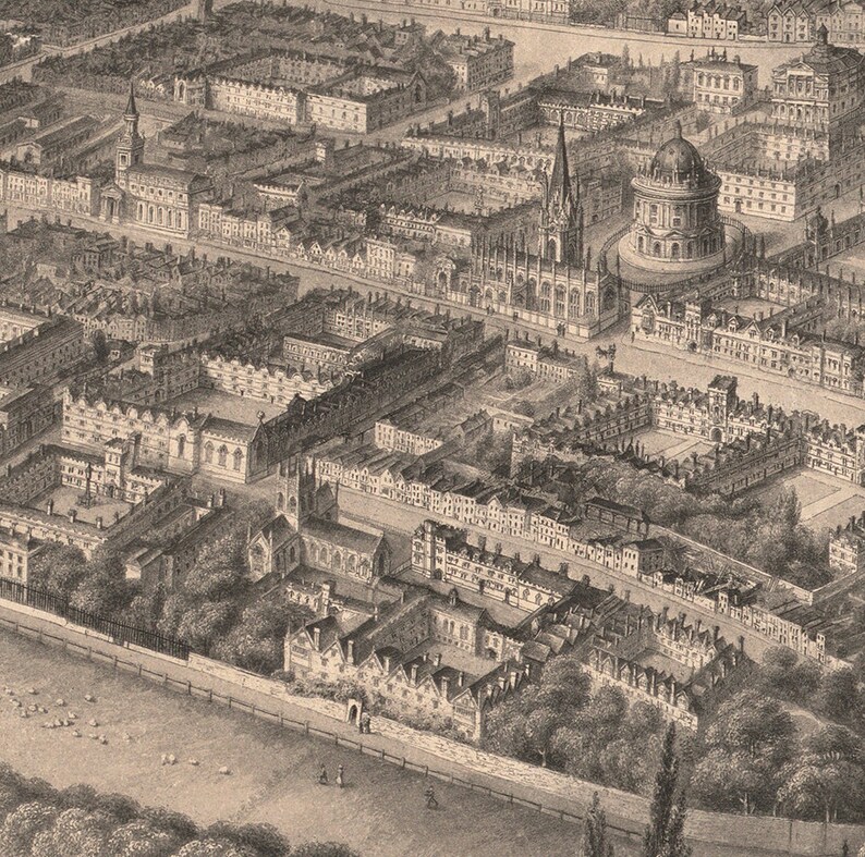 May include: An aerial view of a historic city with a focus on a large, circular building with a dome. The building is surrounded by smaller buildings and trees. The image is in black and white.