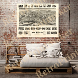 May include: A vintage black and white aerial view map of New Milford, Connecticut. The map shows the town's layout with streets, buildings, and a river. The map is surrounded by smaller images of buildings and businesses in New Milford.