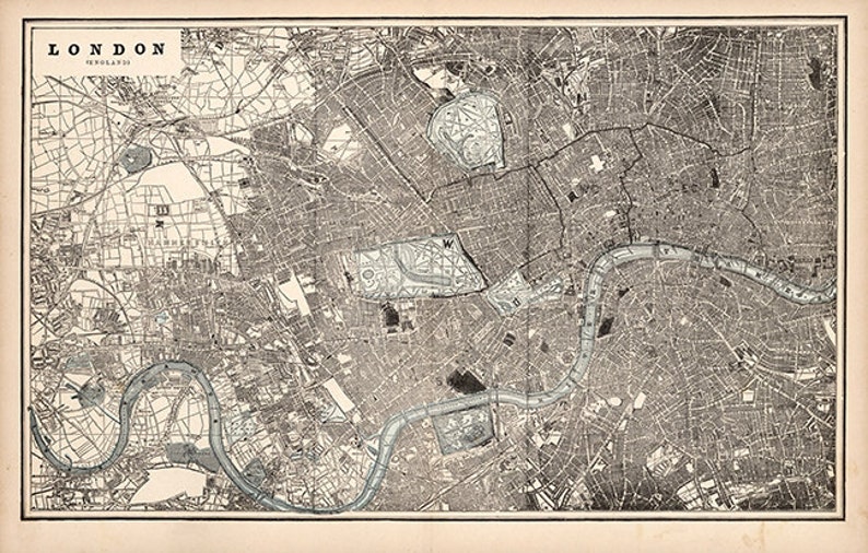 May include: A vintage black and white map of London, England. The map shows the city's streets, rivers, and landmarks. The map is surrounded by a white border.