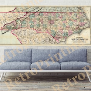 May include: An antique map of North Carolina, printed in black, red, green, and blue ink on a cream-colored background. The map shows the state's counties and major cities, as well as rivers and roads. The title "Map of the State of North Carolina" is printed at the bottom of the map.