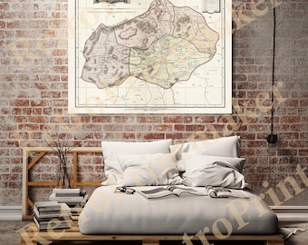 May include: An antique map of Aguascalientes, Mexico, printed on paper with a cream background. The map shows the different regions of the state, including the capital city of Aguascalientes. The map is framed and hanging on a brick wall.