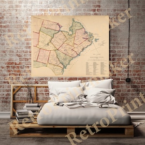 Puede incluir: Un mapa antiguo de la costa marítima del distrito del condado de Buckingham, Virginia. El mapa está impreso en papel envejecido y muestra los límites del condado, las ciudades y las carreteras. El mapa está enmarcado y colgado en una pared de ladrillo.