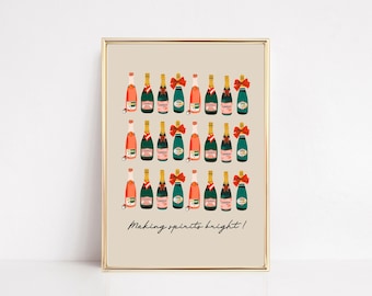 Puede incluir: Impresión enmarcada con filas de botellas de champán verdes, rosas y doradas, cada una adornada con un lazo rojo. La frase "Making spirits bright!" está escrita en negro en la parte inferior. Fondo beige.