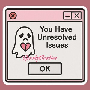 May include: A pink and white computer error message with a sad ghost holding a broken heart. The message reads "You Have Unresolved Issues" and has an "OK" button.