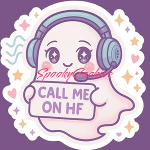 May include: A cartoon ghost wearing blue headphones and holding a sign that says "Call me on HF". The ghost has big eyes and a happy expression. The background is purple with stars and hearts.
