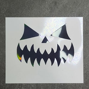 Halloween Jack-o'-Lantern Vinyl Decal - Spooky Pumpkin Face Sticker for Home Decor, Perfect Gift for Halloween Enthusiasts