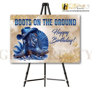 May include: A sign with the text "BOOTS ON THE GROUND Happy Birthday!" features a blue cowboy hat and boots with intricate designs. The background has a gold glitter effect and a watercolor wash.