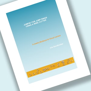 May include: A blue book cover with the title "JUMPIN' FOR JUMP RINGS USING A WIRE CUTTER" and the subtitle "A Jewellery Workbook for Visual Learners". The author's name, "Iris Sandkühler", is printed below the subtitle. A row of gold jump rings is at the bottom of the cover.