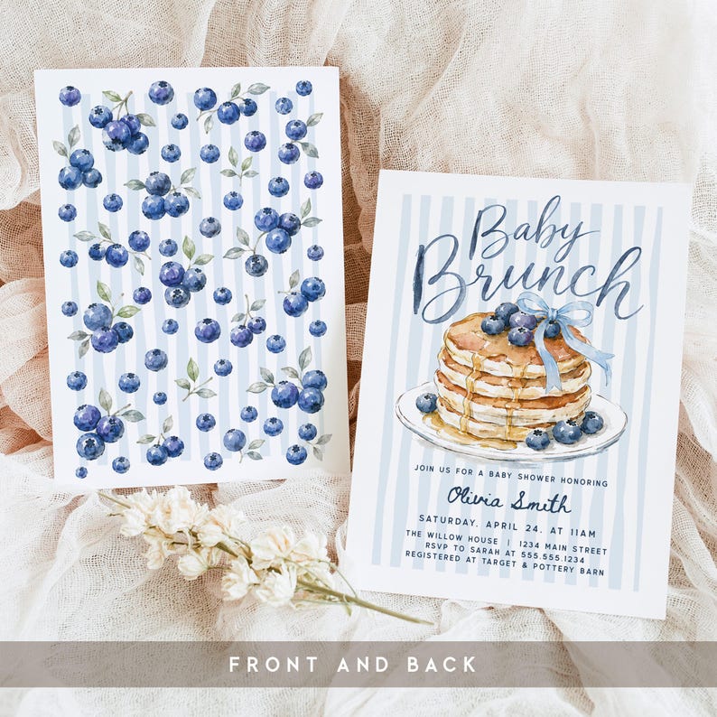 May include: Two rectangular invitation cards with a light blue vertical striped background. The left card features a repeating blueberry pattern. The right card displays a stack of pancakes with blueberries and a blue ribbon, with text reading Baby Brunch.