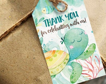 May include: A blue and green thank you tag with a watercolor illustration of a turtle and coral. The tag says "Thank you for celebrating with us!"