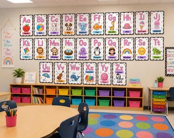 May include: A set of alphabet wall cards featuring letters A through Z, each paired with a colorful illustration and corresponding word. The cards are arranged in three rows on a wall above a wooden storage unit with colorful bins in a classroom.