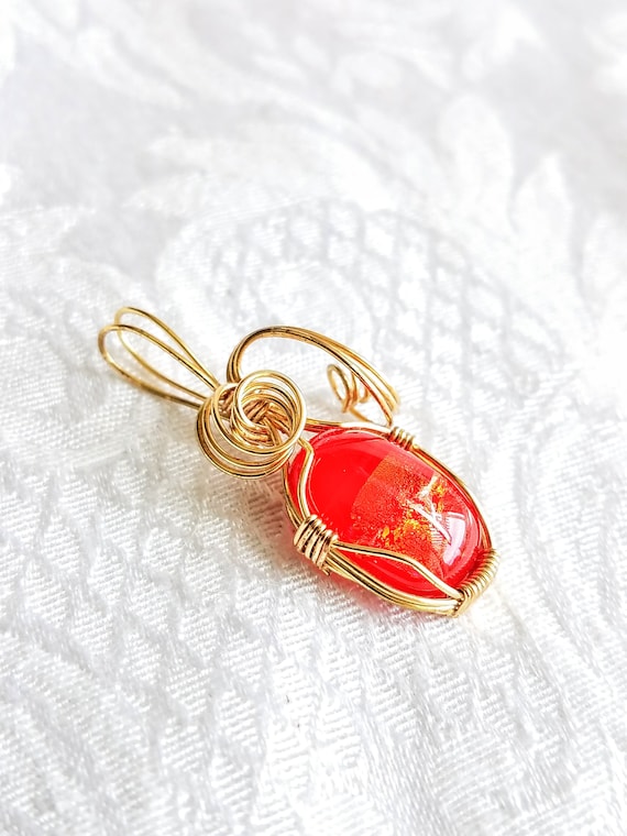 Red and orange fused glass pendant