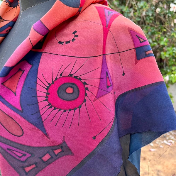 Abstract shape scarf, warm colors, graphic and amorphous forms. satin silk with a delicate shine. In addition a matching padded scarf bag