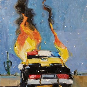 May include: An oil painting depicts a black and yellow car engulfed in flames against a blue sky with stars. The artwork features a desert landscape with a cactus. The flames are orange and yellow.