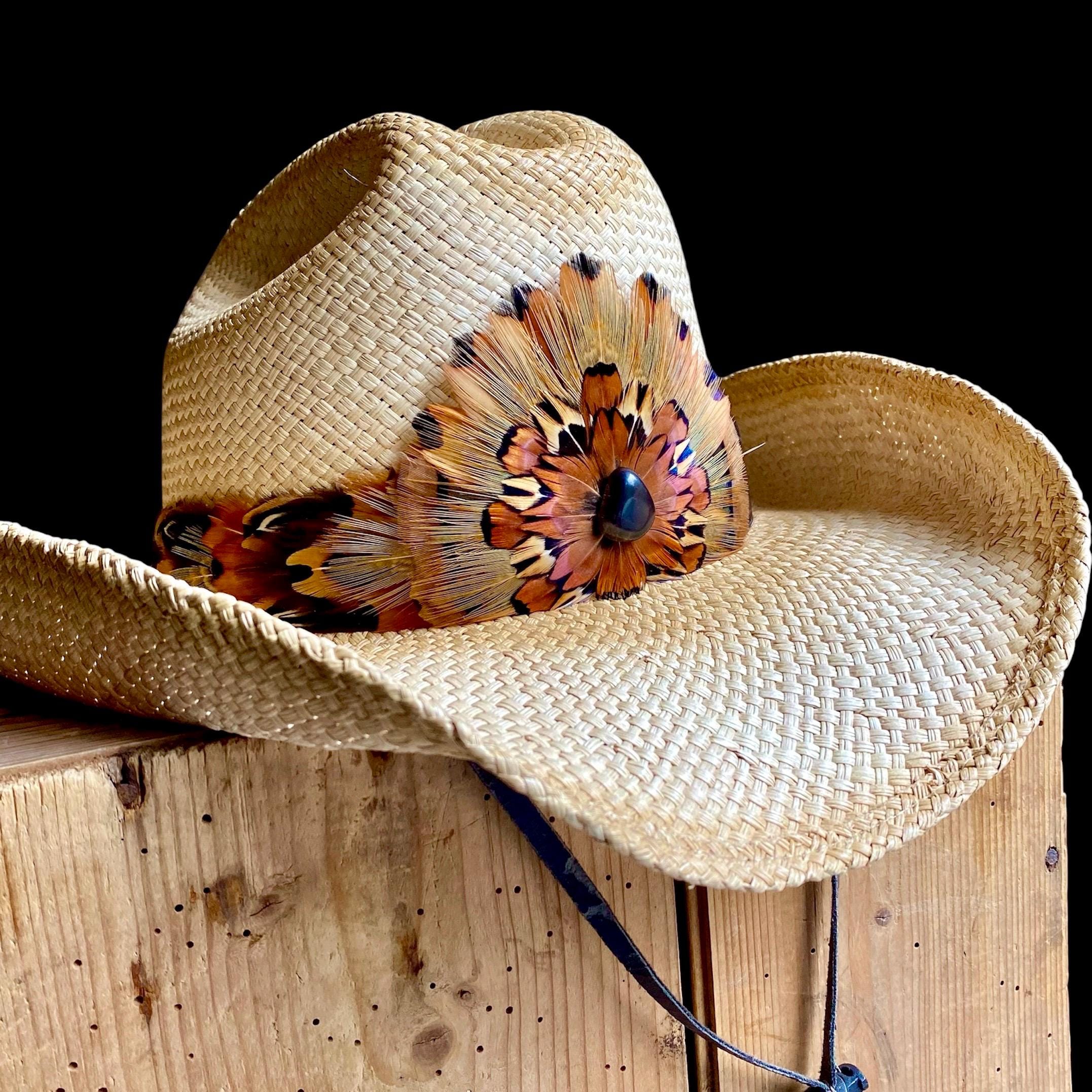 Premium Photo | A brown cowboy hat with a brown band on it sits on a