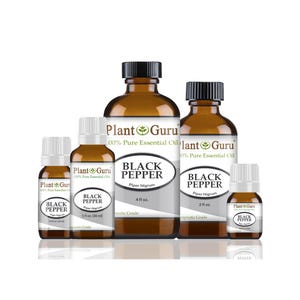 May include: An assortment of amber glass bottles of Plant Guru Black Pepper essential oil. The bottles vary in size, with labels displaying the product name, Piper Nigrum, and volume in fluid ounces. The bottles have black caps and white labels.