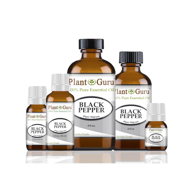 May include: An assortment of amber glass bottles of Plant Guru Black Pepper essential oil. The bottles vary in size, with labels displaying the product name, Piper Nigrum, and volume in fluid ounces. The bottles have black caps and white labels.
