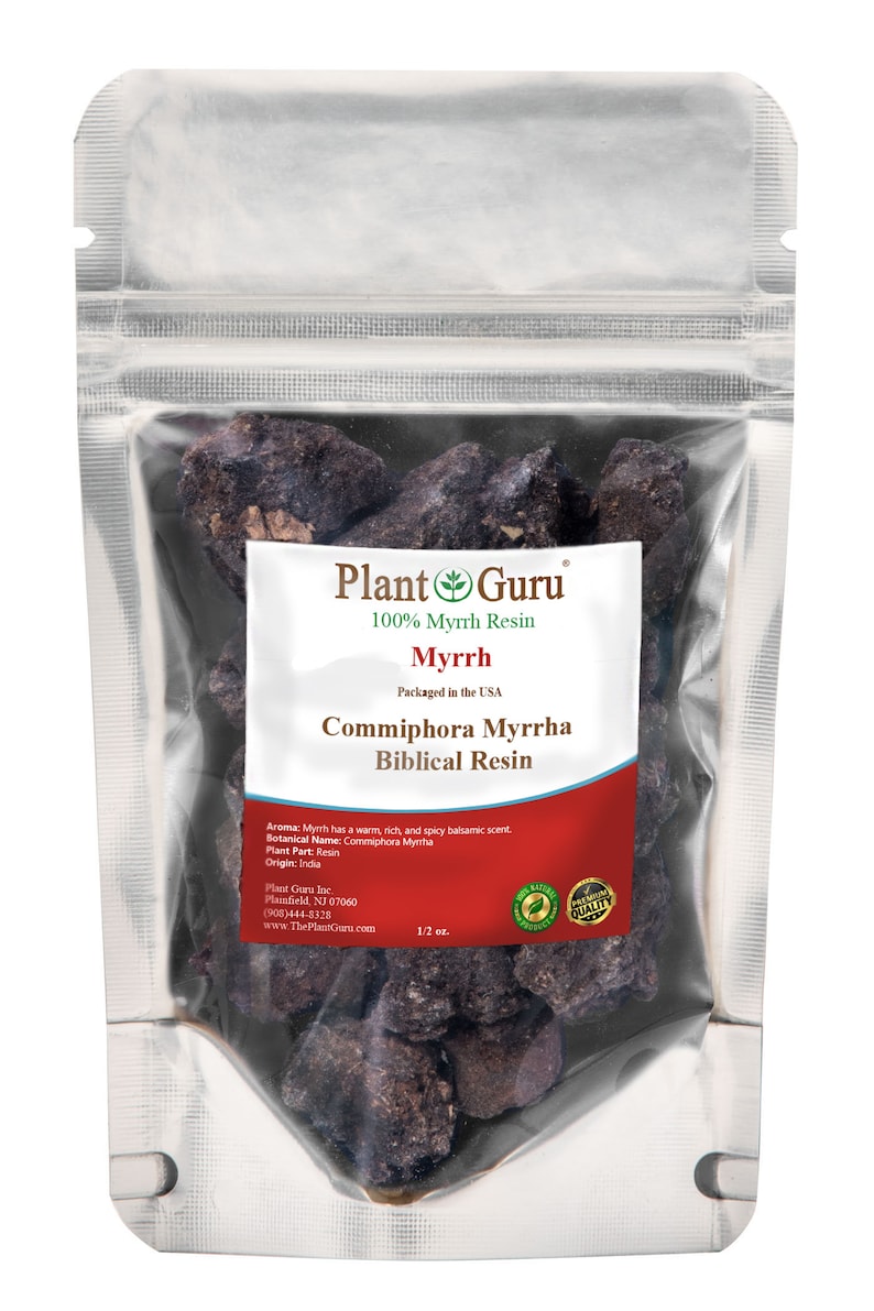 May include: A close-up of a resealable bag containing dark brown myrrh resin. The bag has a label that reads "Plant Guru 100% Myrrh Resin Myrrh Packaged in the USA Commiphora Myrrha Biblical Resin". The label also includes information about the aroma, botanical name, plant part, origin, and company contact information. The bag is 1/2 oz.
