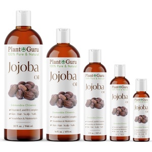 May include: A selection of amber-coloured Plant Guru Jojoba Oil bottles, from 60 ml to 946 ml, are arranged. Each bottle has a white label with the brand name, product name, and a jojoba seed graphic. The labels also list benefits and ingredients.