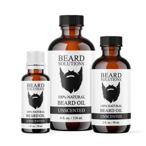 May include: Three amber glass bottles of Beard Solutions unscented beard oil. The bottles are labeled with a black beard graphic and text that reads "100% Natural Beard Oil". Sizes include 1 fl. oz., 2 fl. oz., and 4 fl. oz.