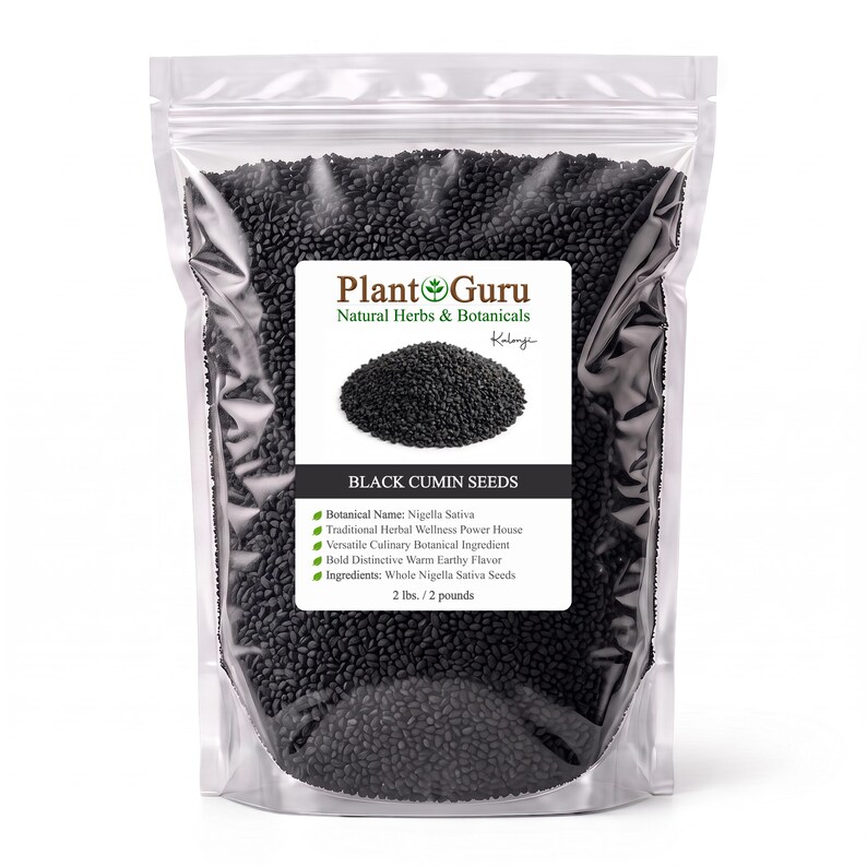 May include: A clear plastic stand-up pouch filled with black cumin seeds. The label features the text Plant Guru Natural Herbs & Botanicals, Black Cumin Seeds, and lists the weight as 2 lbs. / 2 pounds, with a small image of the seeds.