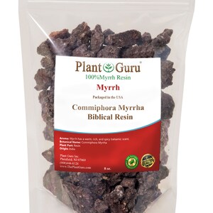 May include: A clear plastic bag filled with dark brown myrrh resin chunks. The bag has a label that reads "Plant Guru 100% Myrrh Resin Myrrh Packaged in the USA Commiphora Myrrha Biblical Resin". The label also includes information about the product, such as the botanical name, plant part, origin, and contact information for the company.