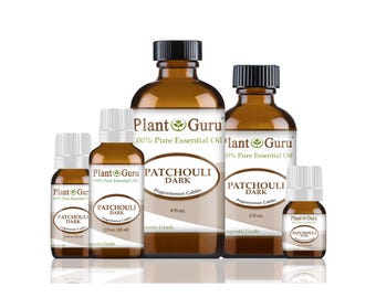 May include: A collection of amber glass bottles of Plant Guru Patchouli Dark essential oil. The bottles vary in size, from small vials to larger bottles, all with black caps and white labels. The labels include the text "100% Pure Essential Oil".