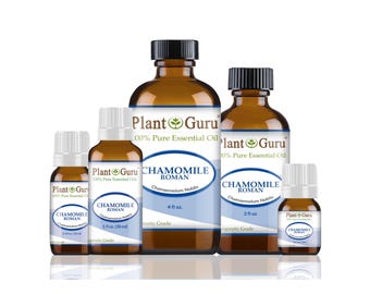 May include: An assortment of amber glass bottles of chamomile roman essential oil. The bottles have black caps and white labels. The labels read "Plant Guru" and "Chamomile Roman". The largest bottle is labeled 118 ml.
