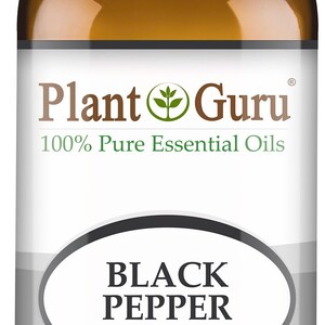 May include: A brown glass bottle of Plant Guru Black Pepper essential oil. The label includes the text "BLACK PEPPER" and "Piper Nigrum". The bottle contains 1 fl oz (30 ml) of oil.