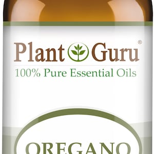 Puede incluir: Una botella de vidrio marr&oacute;n de aceite esencial de or&eacute;gano con una tapa blanca. La etiqueta dice "Plant Guru" y "100% Pure Essential Oils". La etiqueta tambi&eacute;n indica "OREGANO" y "1 fl oz. (30 ml)."