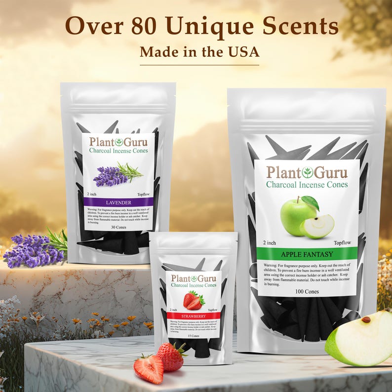 Op de afbeelding: Drie zakken Plant Guru houtskool wierookkegels, met lavendel, aardbei en appel fantasie geuren. De zakken worden getoond op een stenen oppervlak, met de tekst "Over 80 Unique Scents Made in the USA".