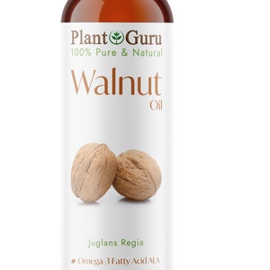May include: A brown glass bottle with a white cap, labeled "Plant Guru 100% Pure & Natural Walnut Oil". The bottle contains walnut oil and has a label with the botanical name "Juglans Regia", and lists the benefits of the oil, including omega-3 fatty acids, skin, hair, scalp, and nails. The bottle is 8 fluid ounces or 237 milliliters.