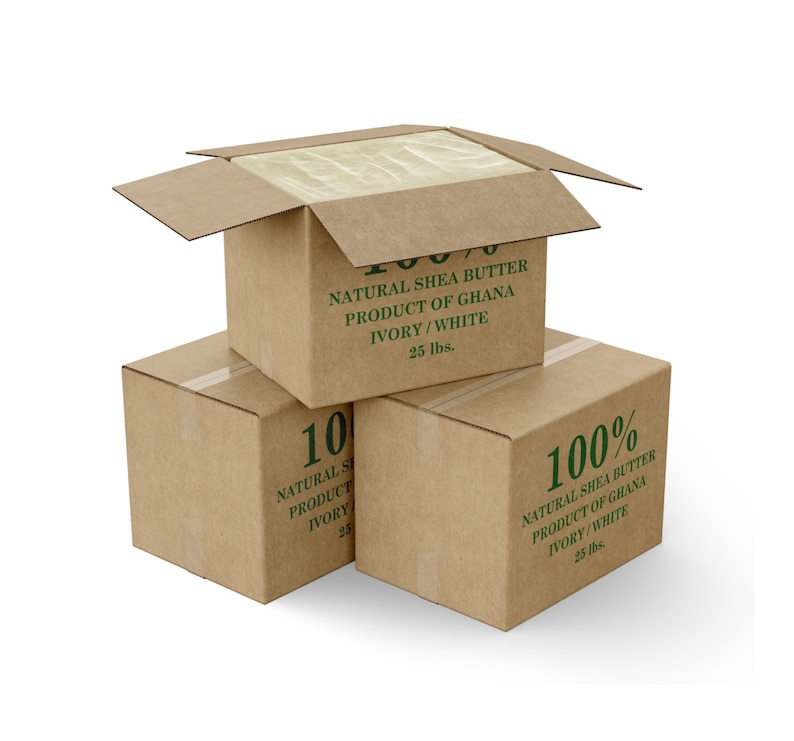 May include: Three cardboard boxes stacked on top of each other. The top box is open and the inside is filled with a white substance. All three boxes are labeled "100% Natural Shea Butter Product of Ghana Ivory/White 25 lbs."