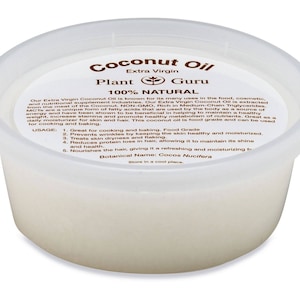 May include: A white plastic container of extra virgin coconut oil labeled "Coconut Oil" with the words "Plant Guru" and "100% Natural" printed on the label. The label also includes the botanical name "Cocos Nucifera" and instructions for usage.